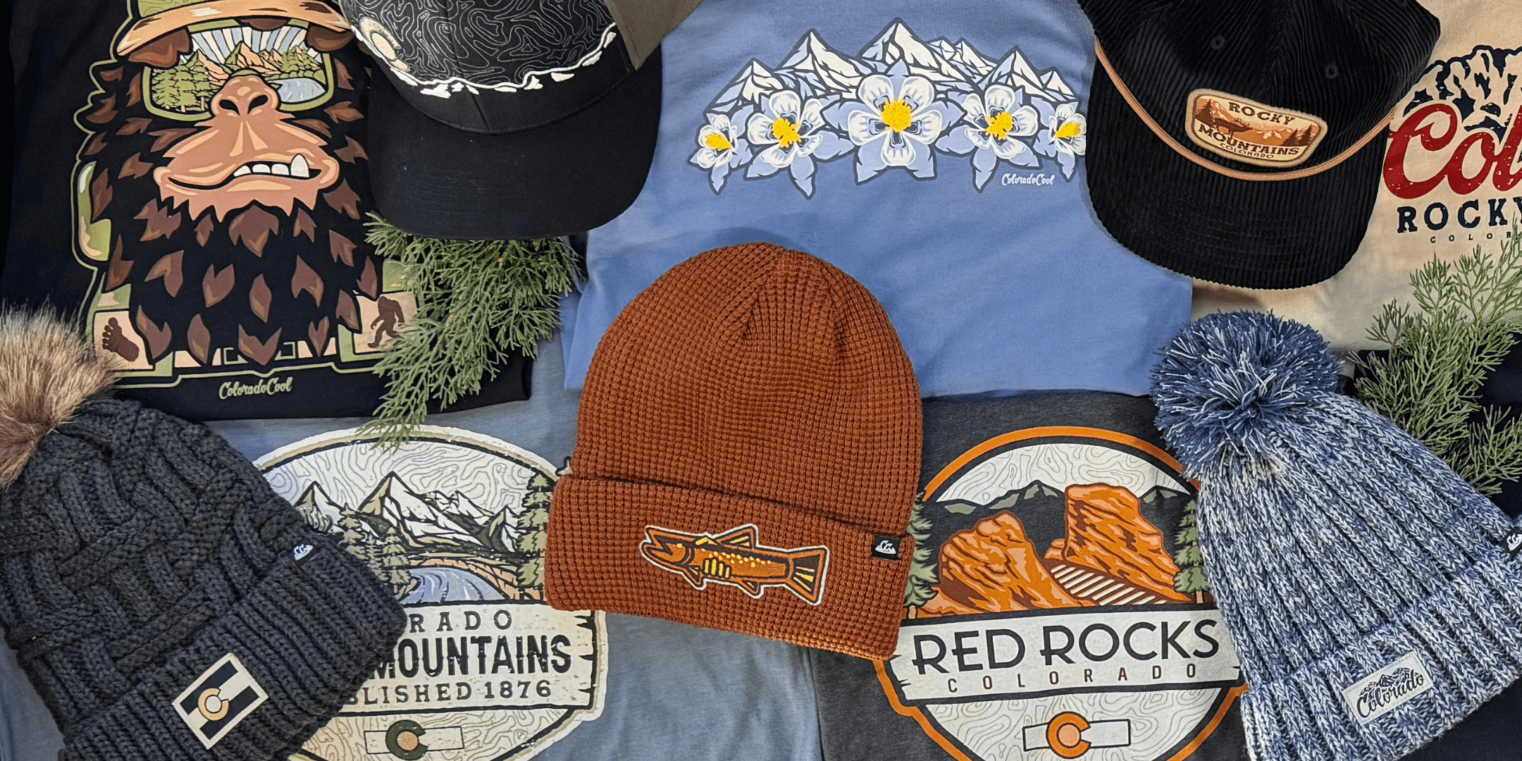 layout with a variety of colorado hats, tshirts, and beanies